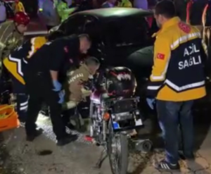  İnegöl’de otomobil ile motosikletin çarpışması sonucu otomobilin altında kalan